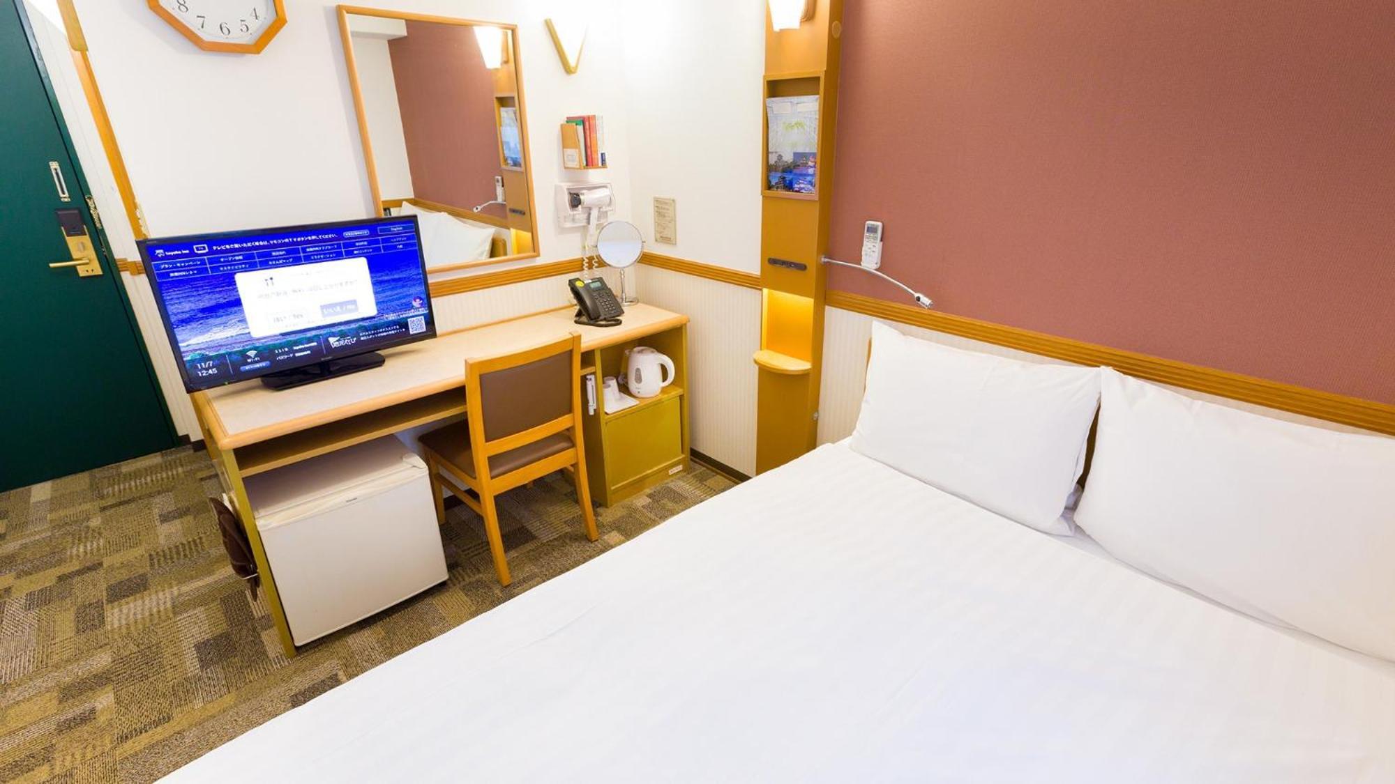 Toyoko Inn Okayama Eki Nishi Guchi Migi Rum bild